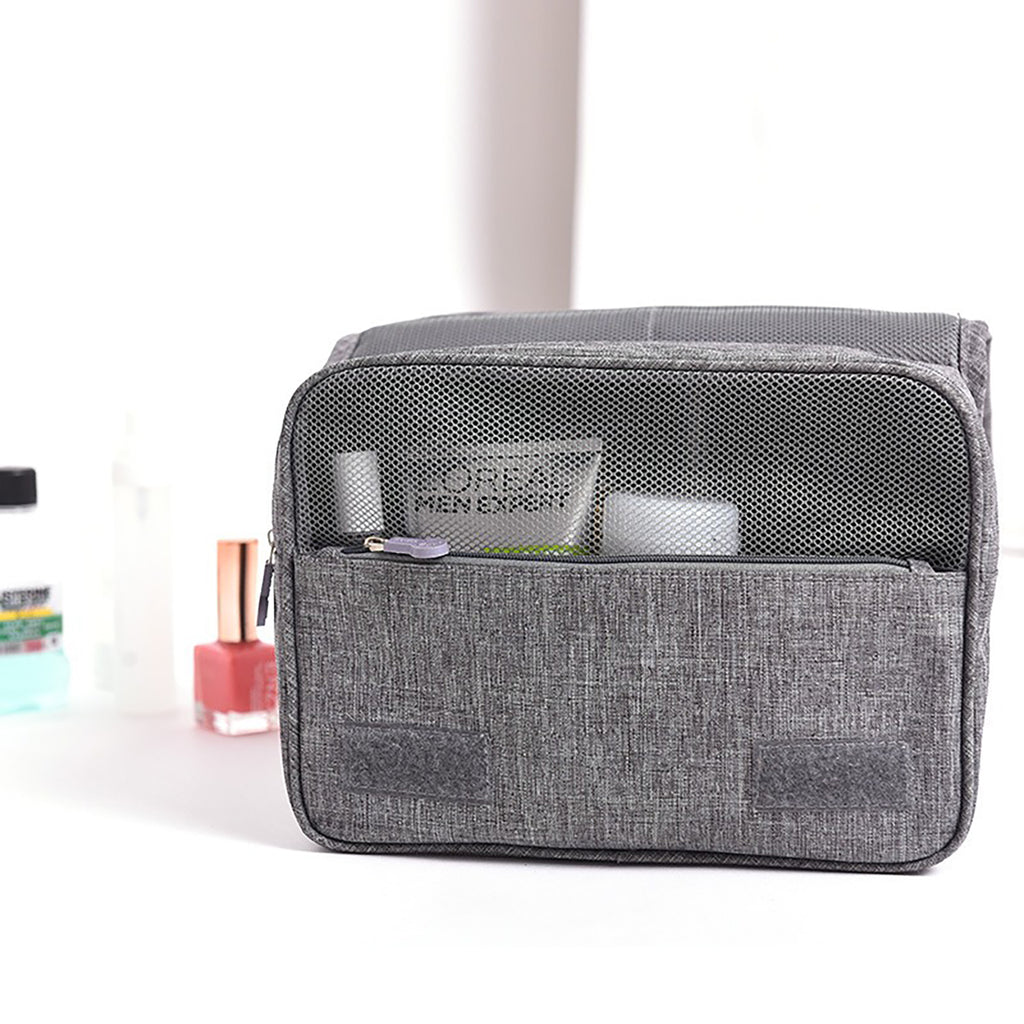 Hanging toiletry bag open with waterproof pocket